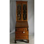 An Edwardian narrow inlaid mahogany bureau bookcase, H.198 W.57 D.47cm