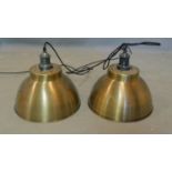 A pair of industrial style brass ceiling light pendants, H.30 D.33cm