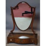 A Regency mahogany shield shape swing mirror, on serpentine base, with 3 drawers, H.62 W.45 D.20cm