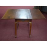 A 20th century mahogany pembroke table, with short drawer raised on cabriole legs, H.70 W.120 D.90cm