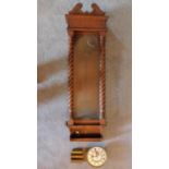 A late 19th century oak cased Vienna regulator case with original movement and weights. (not