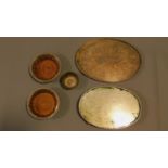 A pair of silver plated wine coasters, a Mappin and Webb bowl, Mappin and Webb tray and another