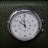 An Italian Pineider leather travel alarm clock, in box with dust bag, 8.5 x 7cm
