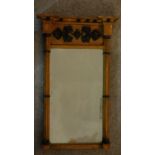 A Regency gilt framed pier mirror with twin cluster columns flanking original glass plate. 69x42cm