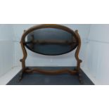 An Edwardian mahogany skeleton framed swing mirror. H.43 W.30cm