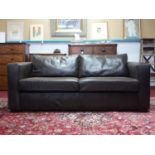 A contemporary 2 seater leather sofa, 2nd of pair. Leather is in good conditions though slightly