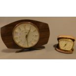 A vintage Metamac mantel clock and a similar vintage cased travelling clock. 16x22cm