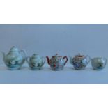 A Japanese tea set and 2 Chinese tea pots 18x18cm.