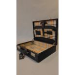 A black Burberrys fitted briefcase. 44x34cm