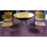 A two tier octagonal teak topped table, together with four matching chairs, H.71 W.92 D.92cm (table)