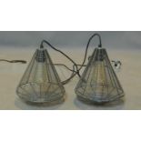 A pair of industrial style wire mesh cone shaped ceiling light pendants, H.26 D.25cm