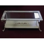 A French cream painted wrought iron and wooden coffee table, with bevelled glass top, H.40 W.110 D.