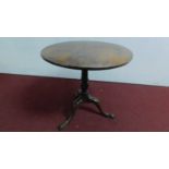 A late Georgian mahogany circular tilt top table on tripod cabriole supports. H.71 W.73cm