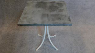 A painted metal garden table with pewter top. H.65 W.54cm