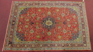 A northwest Persian sarouk mahal carpet, central double pendant medallion with repeating spandrels