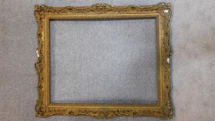 A large 19th century vacant gilt wood and gesso picture frame, 116 x 94cm - outer, 92 x 74cm - inner