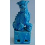 A Chinese turquoise glazed guardian lion. 18x8cm