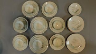 A Japanese eggshell tea set comprising 8 cups and saucers etc