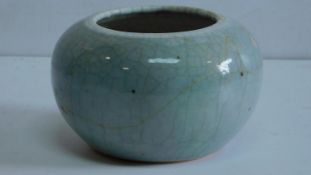 A light blue crackle glazed Chinese brush pot. 8x14cm.