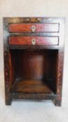 A small Chinese laquered cabinet fitted drawers to frieze. H.60 W.40 D.33cm