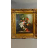 A large oil on canvas in ornate gilt frame, still life flowers, signed Charles Tucker. 74x84cm
