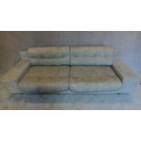 A contemporary grey Habitat sofa. 68x240x84cm