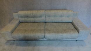 A contemporary grey Habitat sofa. 68x240x84cm