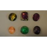 Six various semi precious stones.