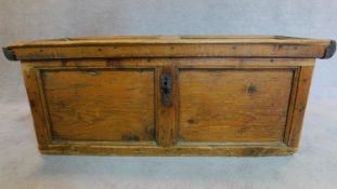 An antique rustic Continental pitch pine coffer. H.120 W.54cm