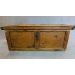 An antique rustic Continental pitch pine coffer. H.120 W.54cm