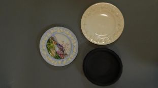 A Wedgwood black basalt bowl and two Wedgewood plates. 27x2cm