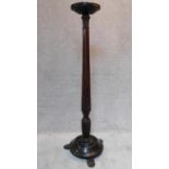 A Victorian carved mahogany torchere stand, H.136cm