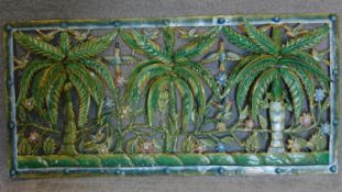 A decorative painted panel made from an oil drum. 145x70cm