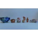 A collection of 6 items of Oriental porcelain and ceramics, to include a Chinese sleeping cat and