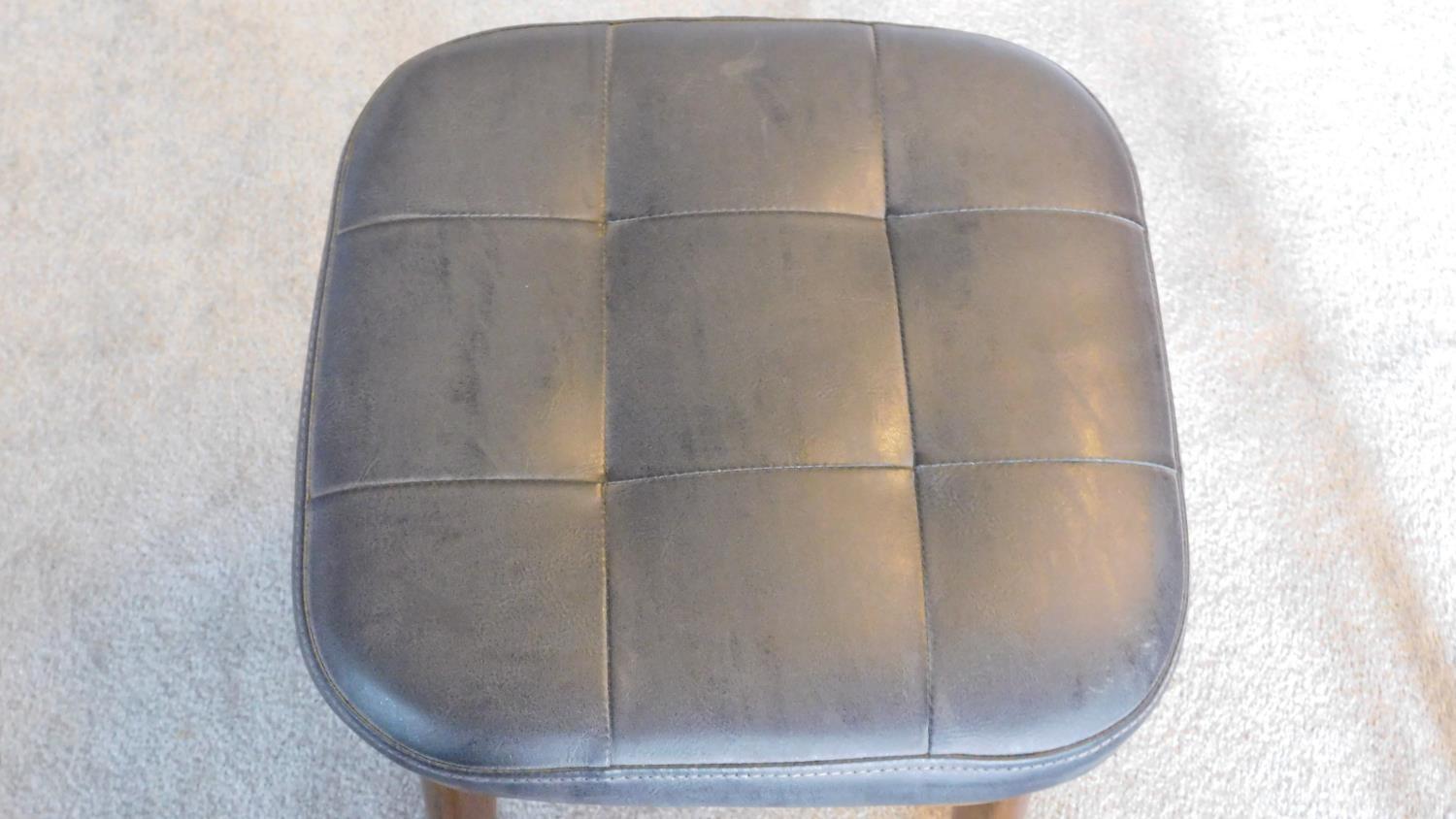 A pair of vintage 1970's ash stools upholstered in buttoned charcoal leather 47x37x37 - Image 3 of 5