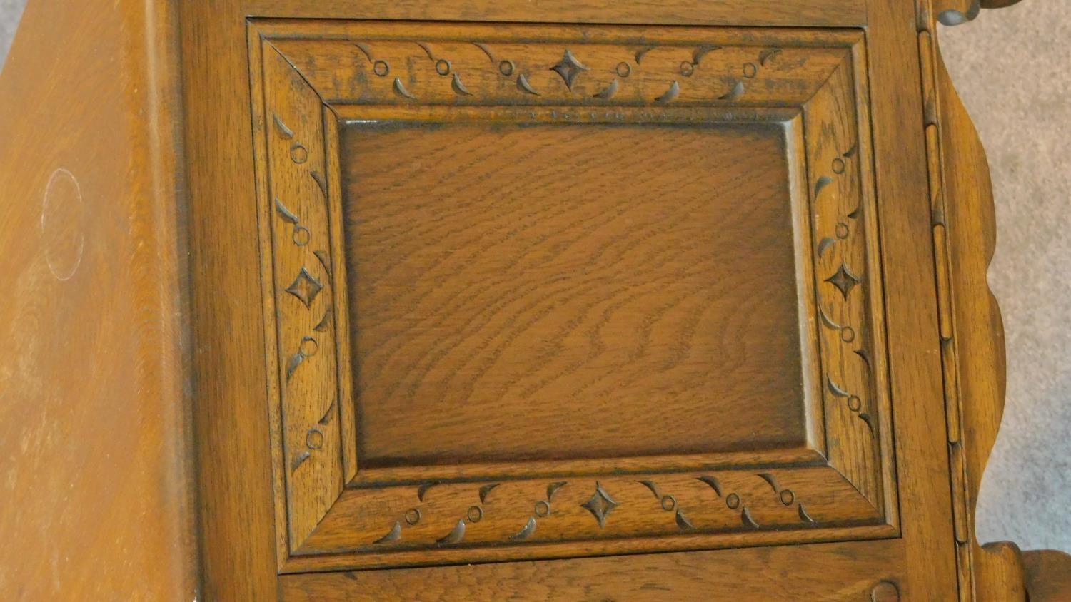 A small Jacobean style court cupboard fitted carved panel door. H.70 W.80 D.33cm - Image 4 of 4