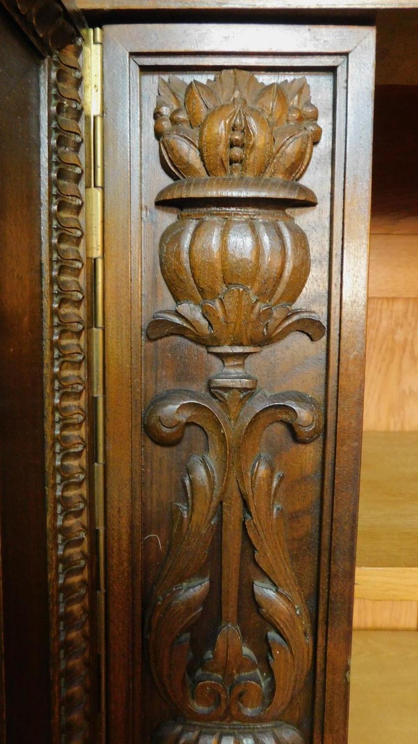 A 1930's German carved oak cabinet with burr walnut inlaid panel doors. H.185 W.233 D.40cm - Image 4 of 7