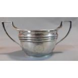 A 19th century silver twin handled sugar bowl, Edinburgh hallmark. 8.40 troy ounces. 23x12cm