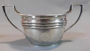 A 19th century silver twin handled sugar bowl, Edinburgh hallmark. 8.40 troy ounces. 23x12cm