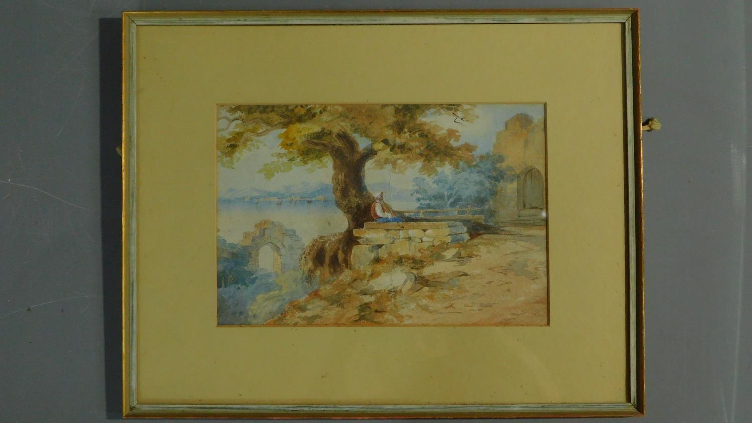 An early 20th century watercolour of a middle eastern man smoking a pipe under an olive tree, with