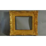 A late 19th century vacant gilt wood and gesso picture frame, 70 x 61cm outer, 47 x 38cm inner