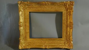 A late 19th century vacant gilt wood and gesso picture frame, 70 x 61cm outer, 47 x 38cm inner