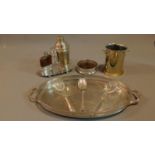 A collection of silver plated items to include a vintage cocktail shaker, wine coaster, wine