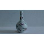 A Chinese mid 20th century bottle vase decorated with butterflies and flowers, red seal mark to