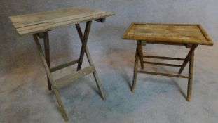 A folding bamboo table and a similar folding teak garden table. (tallest 72cm)