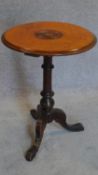 A Victorian inlaid circular top occasional table. 63x44cm