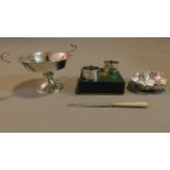 An English hallmarked silver tazza, a pair of napkin rings, a mother of pearl handled paper knife