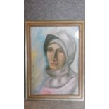 A 20th century oil on board, portrait of a lady wearing a head scarf, signed, 50 x 34cm
