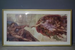 A framed and glazed print of Michelangelo's The Creation of Adam, 44 x 80cm