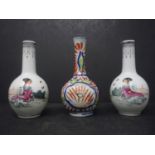 A pair of Chinese miniature vases, decorated with a lady in a garden setting, seal mark to bases,